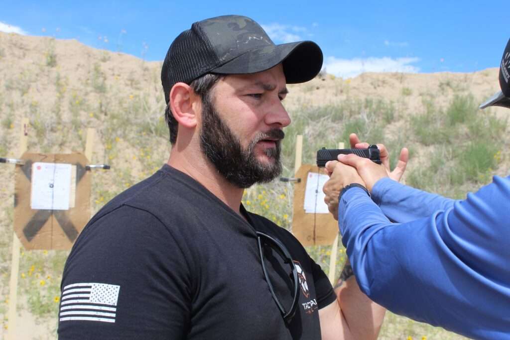 Dave W instructs a customer Tactical Hyve Cheat Codes of Shooting